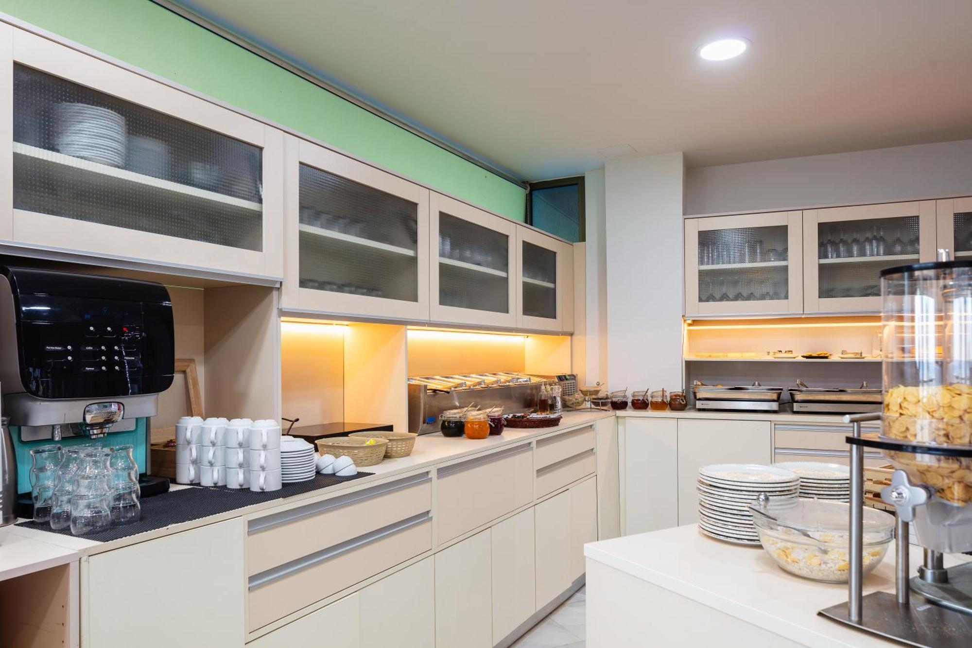 Steris Elegant Beach Hotel & Apartments 罗希姆诺 外观 照片